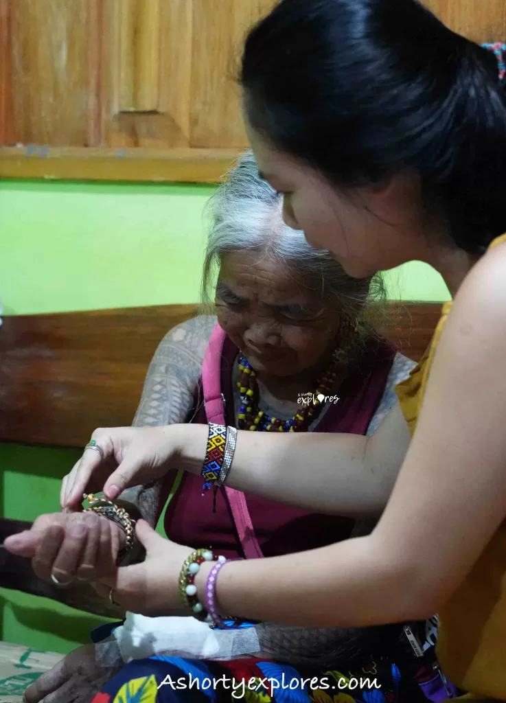 Apo Whang Od and her souvenir