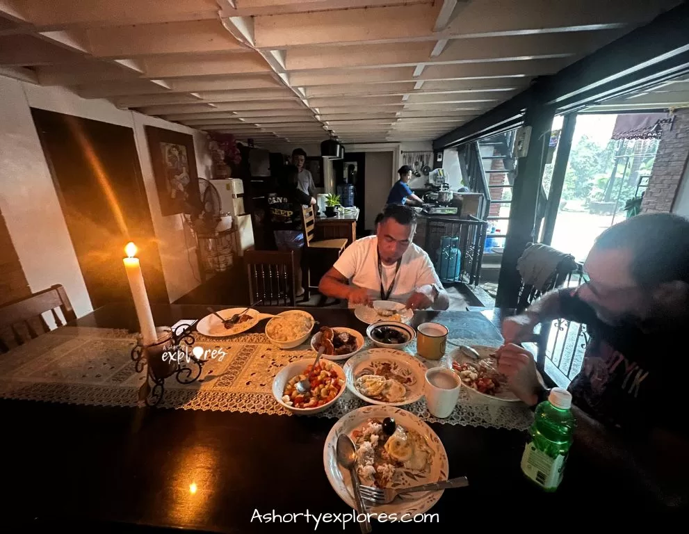 Typhoon day breakfast with candle at Vigan homestay